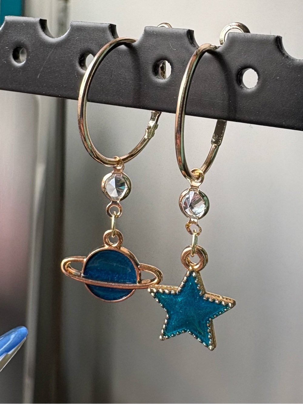 Gold Hoop Earrings with Blue Star and Planet Charms